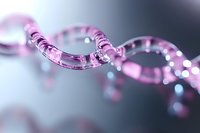 Pink translucent chain links in macro photography with soft bokeh background, modern abstract design element showing connection and strength concept.
