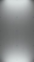 Brushed metal surface with fastener details, featuring neutral gray tones and subtle reflections suitable for industrial, technology, and modern design backgrounds.