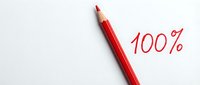Red pencil with 100% text written in matching red color on white paper background for business success and achievement concepts.