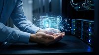 Cybersecurity professional holding digital lock icon above server equipment, representing data protection, network security, and IT infrastructure management for enterprise solutions.