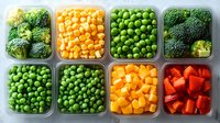 Fresh vegetables and fruits in plastic containers for meal prep, including broccoli, corn, peas, and red peppers arranged in neat rows showing healthy food storage.