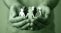 Protective hands cupping paper cutout figures representing community support, teamwork, diversity and human connection in green monochrome tone.