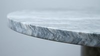 Elegant gray marble surface with natural veining patterns for luxury interior design and product display backgrounds.