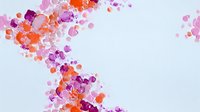 Vibrant watercolor splashes in pink, purple and orange create flowing abstract pattern on white background, suitable for modern wall art and stationery design.