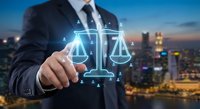 Professional businessman touching digital justice scales hologram over city skyline at dusk representing legal technology and law firm services.
