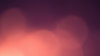 Soft gradient background transitioning from warm peachy tones to deep purple, creating an elegant bokeh effect suitable for overlays, presentations, and design projects.