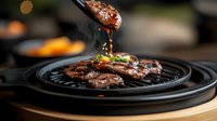 Juicy marinated beef strips sizzling on Korean BBQ grill plate with sauce dripping, garnished with green onions and sesame seeds, dramatic lighting.