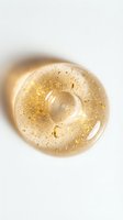 Golden gel texture with shimmer particles and glitter suspended in clear cosmetic serum, isolated on white background for skincare and beauty product design use.