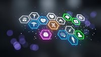 Digital technology hexagonal icons floating with glowing effects on dark background representing modern business innovation and connectivity solutions.