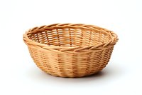 Empty woven wicker basket with round shape isolated on white background. Traditional handcrafted rattan container for bread, fruits or storage.