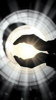 Silhouetted hands cupping glowing orb of light against circular tunnel backdrop with radiating rays, symbolizing hope, protection, energy, spirituality, and innovation for concepts and presentations.