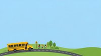 School bus traveling on road with traffic light and green trees on rolling hills under blue sky.
