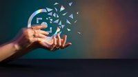 Hand holding glowing lock icon with dispersing particles, symbolizing cybersecurity, data protection, and digital safety for technology and business concepts.