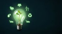 Green energy concept with plant growing inside glowing light bulb surrounded by renewable energy icons on dark background for environmental campaigns.