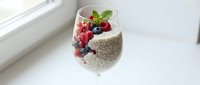 Healthy chia seed pudding with fresh berries and mint in glass, nutritious breakfast dessert for wellness lifestyle and clean eating recipes.