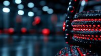 Dramatic close-up of black and red braided cable against dark background with bokeh lights creating moody tech atmosphere. For modern technology and gaming designs.