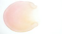 Soft watercolor circle with pink and yellow gradient blending on white background for artistic design projects and creative layouts.