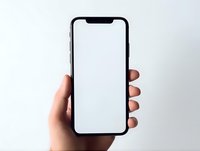 Hand holding modern smartphone with blank white screen mockup on light background, isolated display for app or web design presentation.