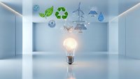 Glowing light bulb with floating eco-friendly icons including recycling symbol, green leaves, wind turbine and water drops in modern minimalist room.