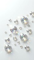 Sparkling heart-shaped diamonds and gemstones scattered on white background with rainbow light reflections for luxury jewelry and wedding designs.