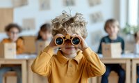 Curious young Caucasian boy in yellow polo shirt looking through binoculars in classroom setting while classmates study at desks, capturing childhood exploration and discovery.