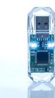 Transparent USB flash drive showing internal circuit board and electronic components isolated on white background for technology design projects.
