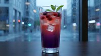 Vibrant berry cocktail with ice and fresh mint in a tall glass, set against a rainy city backdrop, blending urban elegance with refreshing summer vibes.