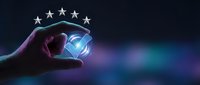 Hand holding glowing orb with five stars above representing premium quality service, excellence rating and customer satisfaction in business concept.