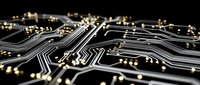 Close-up of illuminated circuit board pathways with glowing golden connections on dark background, suitable for technology, electronics, and digital innovation concepts.