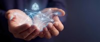 Hands holding glowing network connection with meditation icon, representing digital wellness, mindfulness technology, and spiritual growth in modern communication.