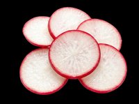 Fresh radish slices arranged in a fan, isolated on transparent background. Ready for food clipart, t-shirt design, stickers, print on demand, and sublimation projects.