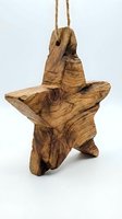 Handcrafted olive wood star ornament with natural grain patterns and rope hanger isolated on white background for holiday decorations and rustic home decor.