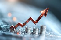 Red metallic arrow rising over stacks of silver coins showing financial growth and investment success against blurred bokeh background.
