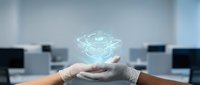Hands presenting holographic brain model in modern office environment for medical technology and artificial intelligence concepts.