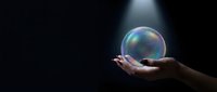 Hand holding glowing iridescent sphere against dark background, symbolizing innovation, future technology, and business potential for corporate presentations.