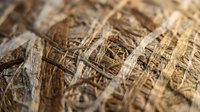 Natural woven coconut fiber texture with organic brown patterns for eco-friendly design projects and sustainable material backgrounds.