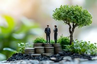 Two businessmen standing on stack of coins with green tree, representing sustainable financial growth and environmental investment strategies.