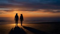 Romantic couple silhouettes walking on beach at sunset with golden sky reflection on water creating peaceful evening atmosphere for love and relationship concepts.