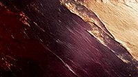 Dramatic diagonal composition with rich burgundy and golden metallic textures creating abstract luxury background pattern with rough stone or mineral surface effect.