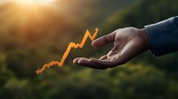 Male hand reaching out with glowing orange stock market growth chart floating above palm against blurred natural background at sunset, representing financial success.