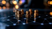 Wooden figures connected by glowing network lines on dark surface with bokeh lights, representing social connections and networking concepts in business.