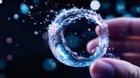 Magical water ring splash with glowing blue light and droplets floating in dark space, captured in macro photography with bokeh effect and fingers in background.