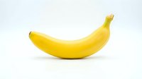 Fresh yellow banana isolated on white background, ready for food and nutrition design projects, packaging, and culinary content.