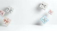 Assorted gift boxes with ribbons arranged on white surface, isolated design element for holiday and celebration projects.