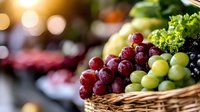 Fresh organic grapes in wicker basket at farmers market with bokeh background for healthy eating and natural food concepts.