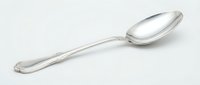 Elegant silver spoon with ornate handle design isolated on white background for culinary presentations, restaurant branding and kitchen utensil graphics.
