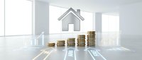 Stacked gold coins arranged in ascending order with house icon and financial growth chart in modern office space, representing real estate investment and wealth accumulation.