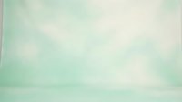 Soft mint green gradient background with blurred bokeh lights and dreamy atmosphere, suitable for wellness, spa, and modern design projects.