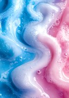 Abstract fluid art background with swirling blue and pink colors blending into white, featuring delicate bubbles and wavy patterns creating dreamy texture.