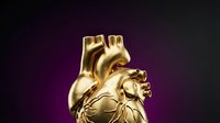 Golden anatomical heart sculpture with metallic finish on purple gradient background for medical education and luxury design concepts.